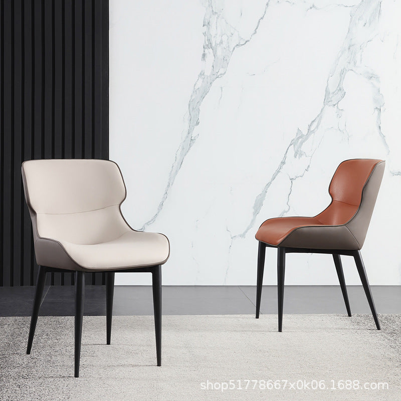 Modern Contrast Dining Chair Curved Back Design Leather Upholstery & Slim Black Legs for Sleek Dining Spaces