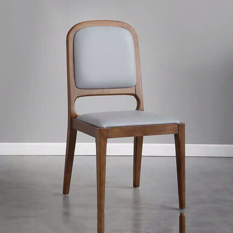 Minimalist Light Luxury Dining Chair Walnut Wood Frame Padded Leather Upholstery & Curved Back Design
