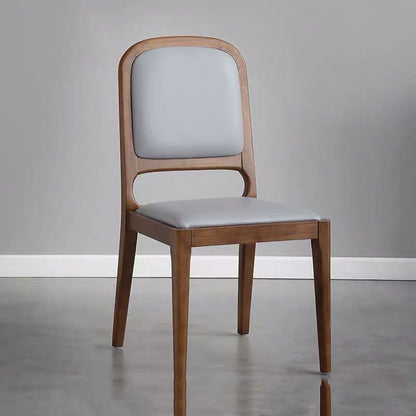 Minimalist Light Luxury Dining Chair Walnut Wood Frame Padded Leather Upholstery & Curved Back Design