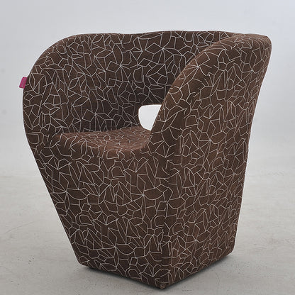 Vibrant Red Modern Hollow-Out Arm Chair Soft Contoured Fabric Seating Sleek Statement Piece for Stylish Living Rooms & Contemporary Spaces