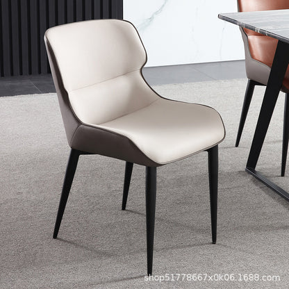 Modern Contrast Dining Chair Curved Back Design Leather Upholstery & Slim Black Legs for Sleek Dining Spaces