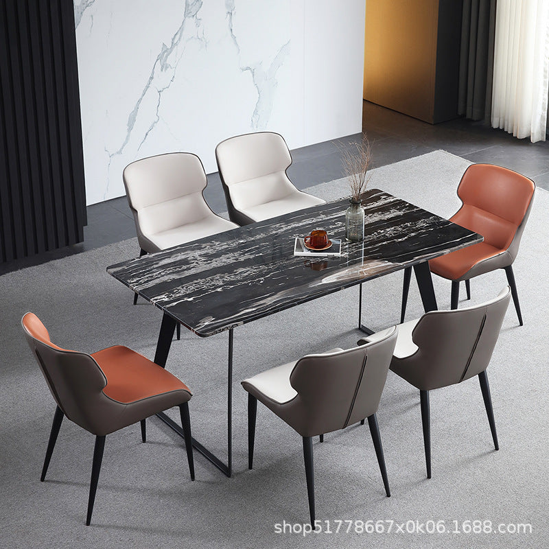 Modern Contrast Dining Chair Curved Back Design Leather Upholstery & Slim Black Legs for Sleek Dining Spaces