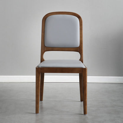 Minimalist Light Luxury Dining Chair Walnut Wood Frame Padded Leather Upholstery & Curved Back Design
