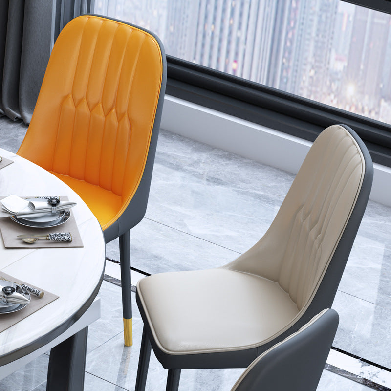 C-10-SITMOD Luxury Contrast Dining Chair: Stitched Back Detail, Gold-Accent Legs & Leather Upholstery for Modern Dining Spaces