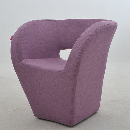 Vibrant Red Modern Hollow-Out Arm Chair Soft Contoured Fabric Seating Sleek Statement Piece for Stylish Living Rooms & Contemporary Spaces