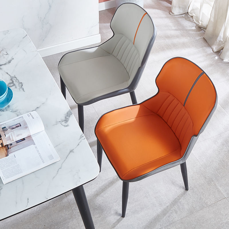 C-08-SITMOD Modern Contrast-Color Dining Chair: Leather Upholstery, Curved Back, Striped Detail for Stylish Dining Spaces