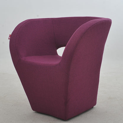 Vibrant Red Modern Hollow-Out Arm Chair Soft Contoured Fabric Seating Sleek Statement Piece for Stylish Living Rooms & Contemporary Spaces